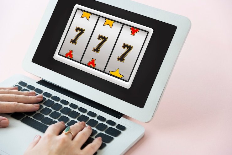 Mobile phone displaying baccarat game with responsible gaming controls and budget settings visible